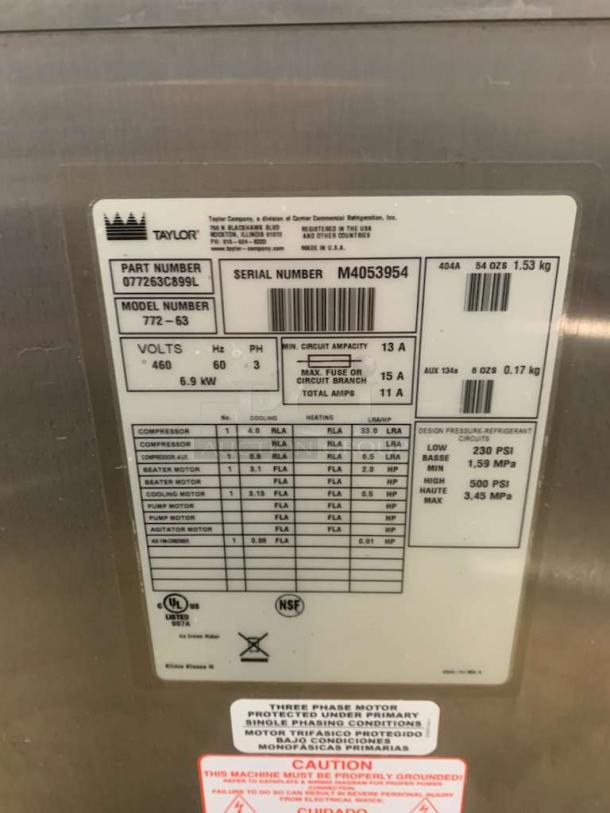 Taylor 772-63 dual soft serve ice cream machine label, showing model, serial number M4053954, 460V, 6.9 kW. Fully tested.