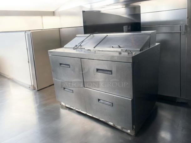 Delfield D4488N-12-A3 refrigerated prep table in prime condition. Stainless steel, 115V, fully tested and working.