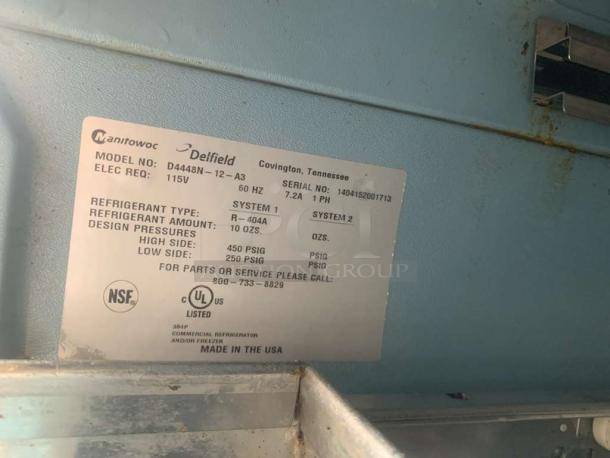 Label on Delfield D4488N-12-A3 refrigerated prep table, 115V, model and electrical specs, NSF and UL listed.