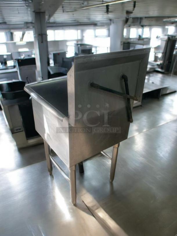 Single-basin stainless steel utility sink, immaculate condition, includes faucet and drainboard, fully tested and working.