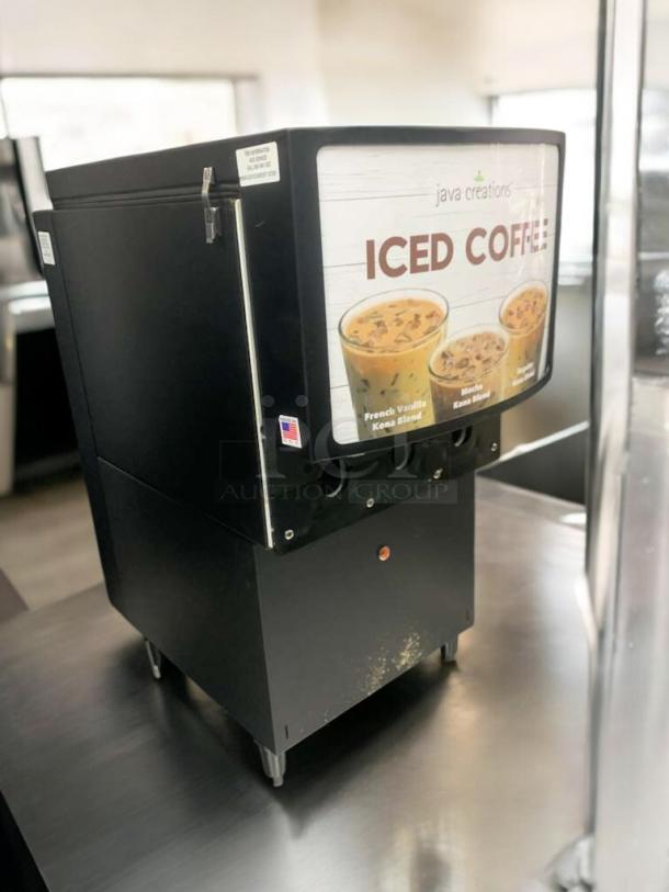 GoodWest GW2/GW3 iced coffee dispenser, 115V, in prime condition. Features iced coffee graphic, fully tested and working.