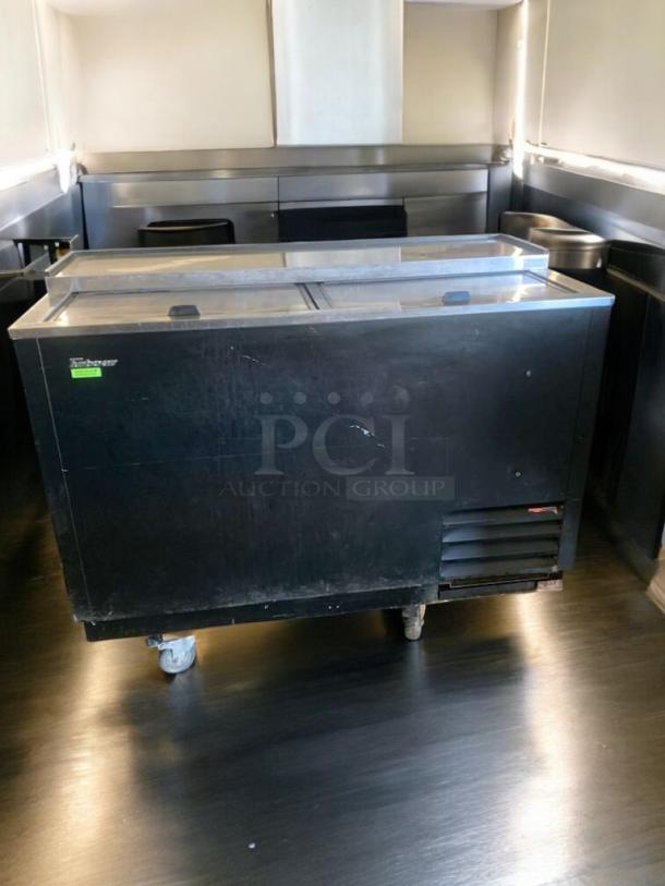 Turbo Air TBC-50SB-N6 bottle cooler, prime condition, black exterior, sliding top doors, on wheels, 115V, fully tested.