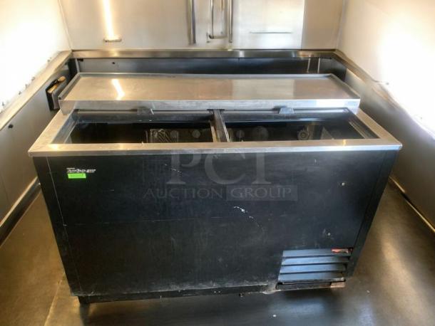 Turbo Air TBC-50SB-N6 bottle cooler in prime condition, 115V, fully tested, black exterior, sliding lid, Turbo Air label.