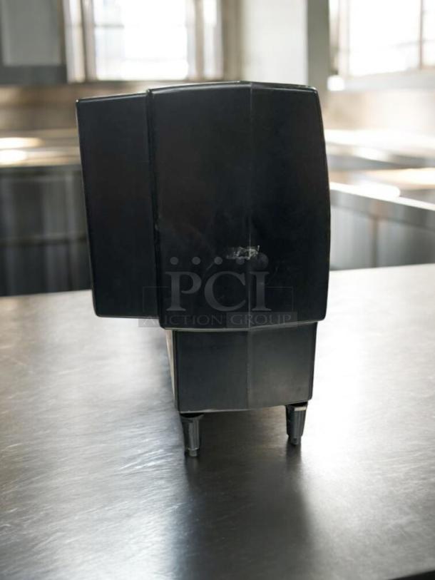 Powder dispenser by Food Concept Developers, Inc., model D-PSPD-5, in impeccable condition, 120V, fully tested.