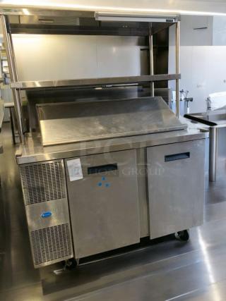 Turbo Air TSU-4RW-N6 Refrigerated Prep Table in prime condition. Stainless steel finish, tested and working, 120V.
