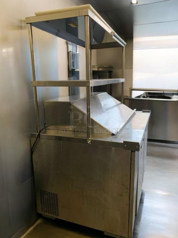Turbo Air TSU-4RW-N6 refrigerated prep table, stainless steel, fully tested, 120V, shelving unit, prime condition.