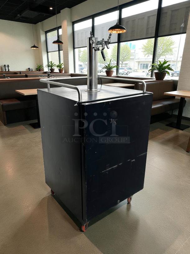 Edgestar BR7001 kegerator, 24" wide, excellent condition, tested and working, black exterior, dual tap, on casters.
