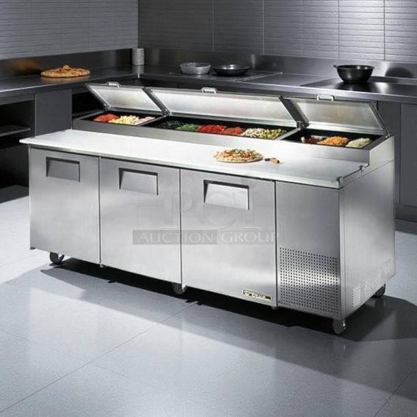 True TPP-93 93" 3-door refrigerated pizza prep table. Stainless steel, tested, working condition, food compartments open.