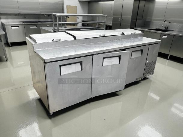 True TPP-93 3-Door Refrigerated Pizza Prep Table, 93", tested and working condition, stainless steel, ideal for commercial kitchens.