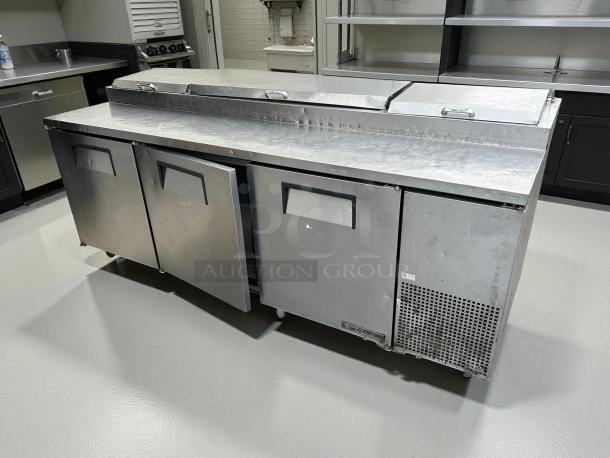 True TPP-93 93" 3-door refrigerated pizza prep table, tested and working, stainless steel, good condition, commercial use.