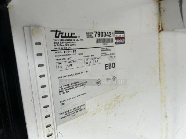 True TPP-93 3-door refrigerated pizza prep table label showing model, voltage, and refrigerant details. Made in USA.