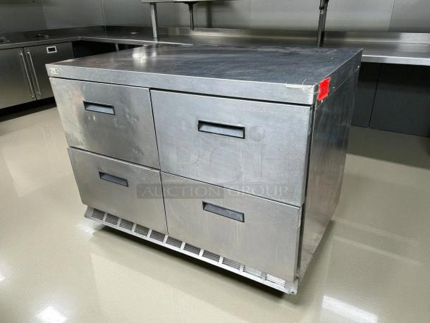 Delfield D4448NP undercounter refrigerator, 48", flat top, 4 drawers, stainless steel, great condition, tested and working.