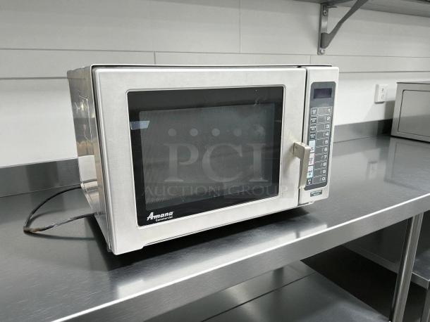 AMANA RFS12MPSA commercial microwave oven, 1200 watts, stainless steel, keypad controls. Tested, working, excellent condition.