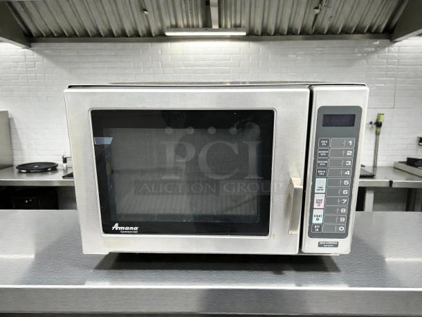 AMANA RFS12MPSA commercial microwave oven, 1200 watts, 120 volts. Stainless steel, tested and working, keypad controls.