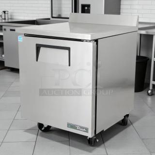 True TWT-27F-HC 28" worktop freezer, excellent condition. One section, right hinge door, 115v, tested and working.