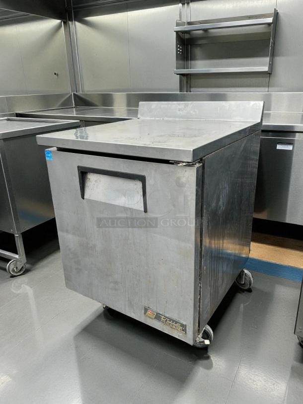 True TWT-27F-HC worktop freezer, 28" wide, one section, right hinge door, on wheels. Excellent condition, 115v.