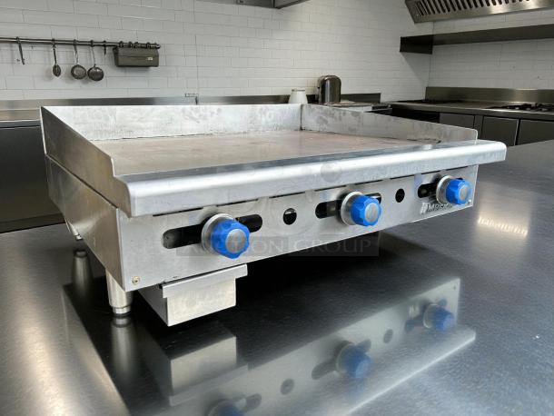 Imperial ITG-36 36" commercial gas griddle with thermostatic controls, tested and working, stainless steel, blue knobs.