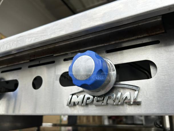 Imperial ITG-36 36" commercial gas griddle with blue thermostatic control knob, branded logo visible, in good condition.