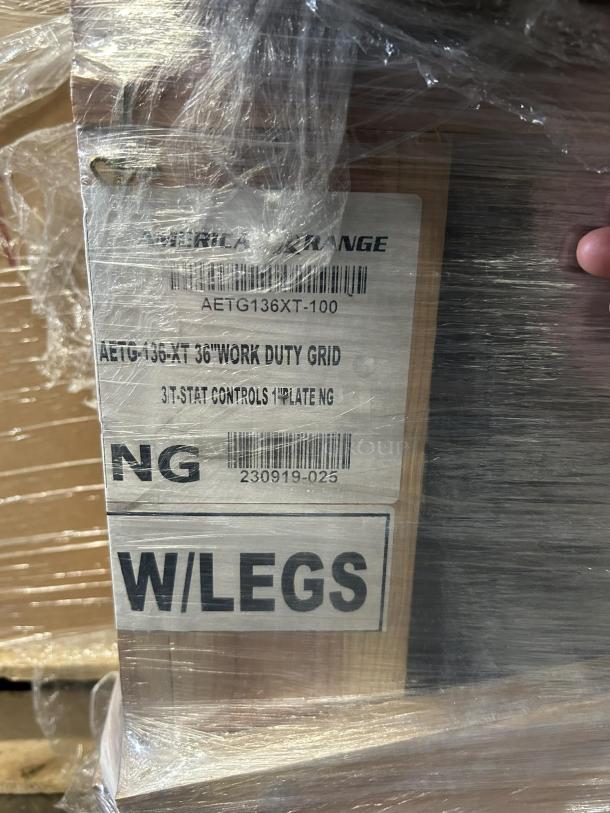 Brand new American Range Model AETG136XT-100, 36" countertop grid. Features 3 T-stat controls, 1" plate, NG fuel, with legs.