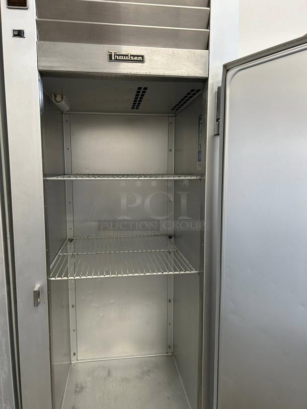 Traulsen G10010 30" G Series refrigerator with right hinged door. Silver finish, interior shelving, tested, and working.