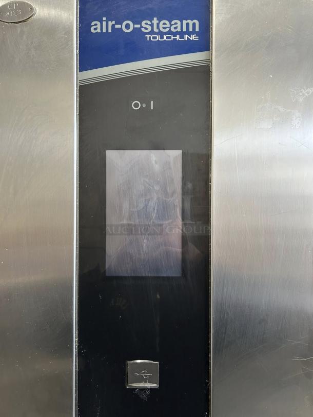 Electrolux Air‑o‑Steam Touchline AOS202GTP1 combi oven, natural-gas, tested, working, touchscreen, stainless steel panel.