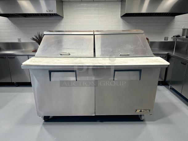 True TSSU-60-24M-B-ST-HC mega top refrigerated sandwich prep table in excellent condition, tested and working.