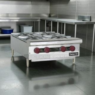 Brand new Therma-Tek TCHP24-4-LP 24" LP gas hot plate with four burners, red knobs, stainless steel finish, tested and working.