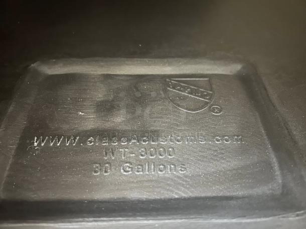 Brand new Class A WT-3000 waste tank, 30-gallon capacity, labeled with model and capacity details, shown in excellent condition.