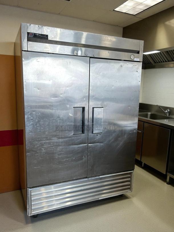 True TS-49F-HC 54" reach-in freezer, 2-section, solid doors, excellent condition, stainless steel, tested and working.