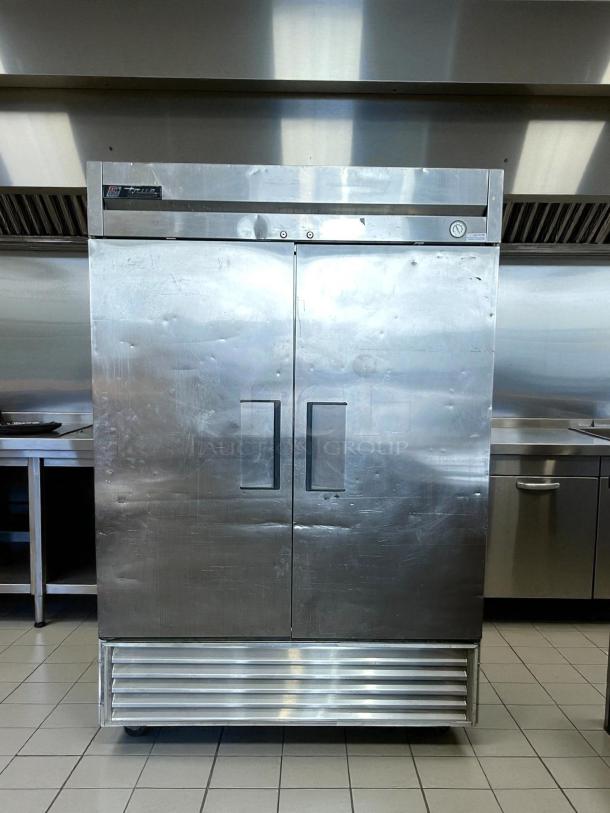 True TS-49F-HC 54" reach-in freezer, 2 solid doors, excellent condition, tested and working, stainless steel exterior.