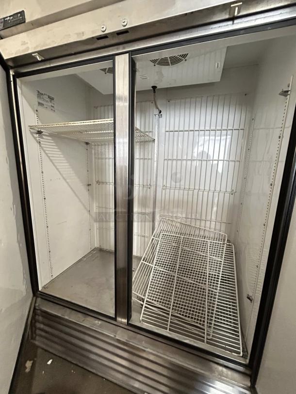 True TS-49F-HC 54" Reach-In Freezer, 2 solid doors, excellent condition, interior shelving, tested and working.