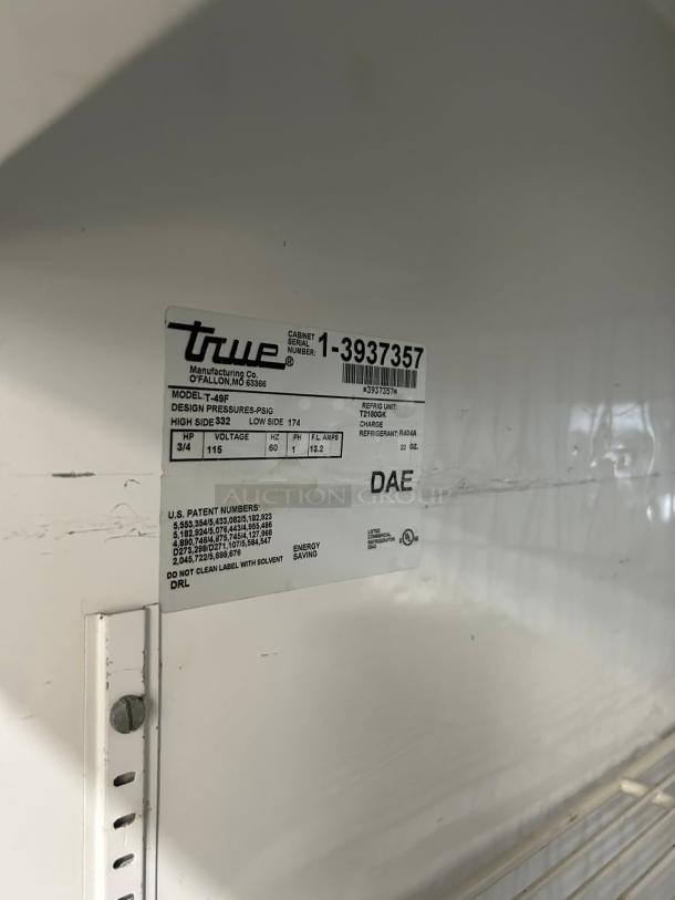 True TS-49F-HC 54" reach-in freezer tag, model and serial numbers visible, excellent condition, tested and working.