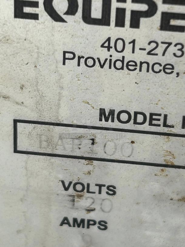 Equipex BAR-100/1 toaster oven label. 120V, model number partially visible. Shows signs of wear.