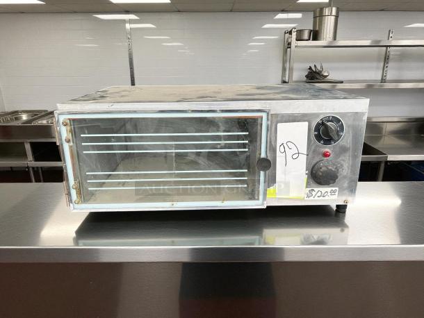 Wisco 616B commercial convection oven, single door, used, tested and working, controls visible, price label showing "$120".