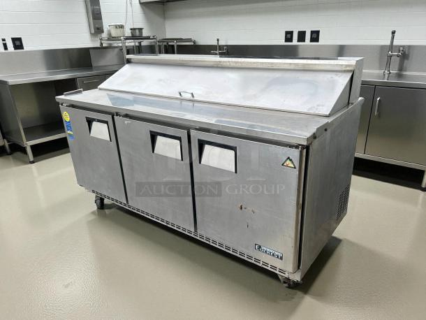 Everest EPBNR3 stainless steel refrigerated prep table, 71 1/8", features 3 solid doors, tested, working condition.