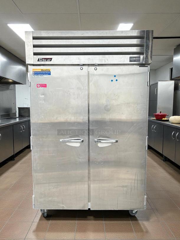 Turbo Air PRO-50F-N freezer, 48.3 cf, stainless steel, 2 solid swing doors, excellent condition, quality assurance labels visible.