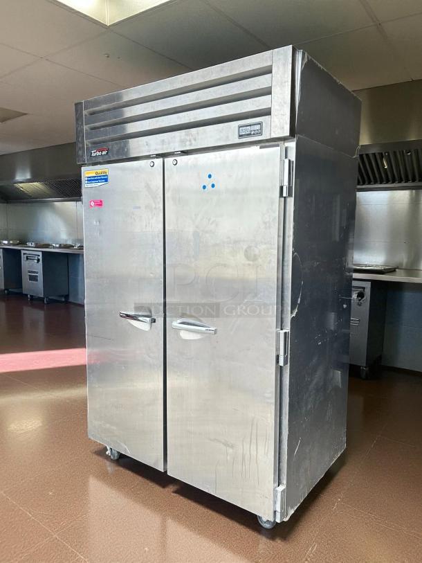 Turbo Air PRO-50F-N freezer, excellent condition, 48.3 cf, two solid swing doors, tested and working, quality labels visible.
