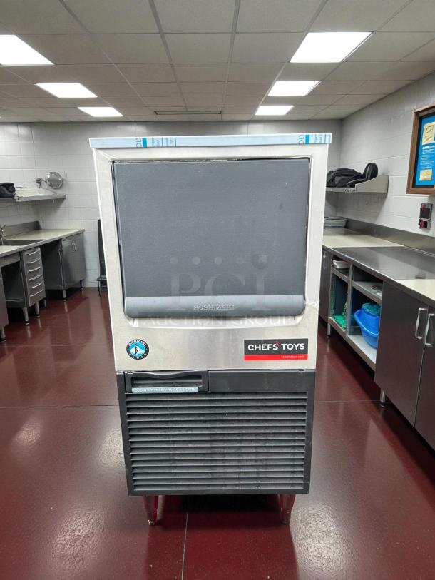 Hoshizaki KM-81BAJ ice machine, undercounter model, tested and working, holds 38 lb., air-cooled, clear daily usage tag visible.