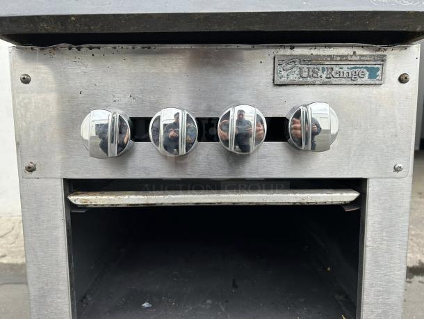 US Range Regal Series 2-burner pot stove, tested and working. Stainless steel, shows moderate wear. Includes US Range badge.