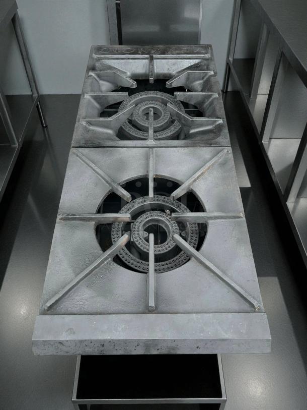 US Range Regal Series 2-burner pot stove, tested and working, in good condition. Features durable cast iron burners.