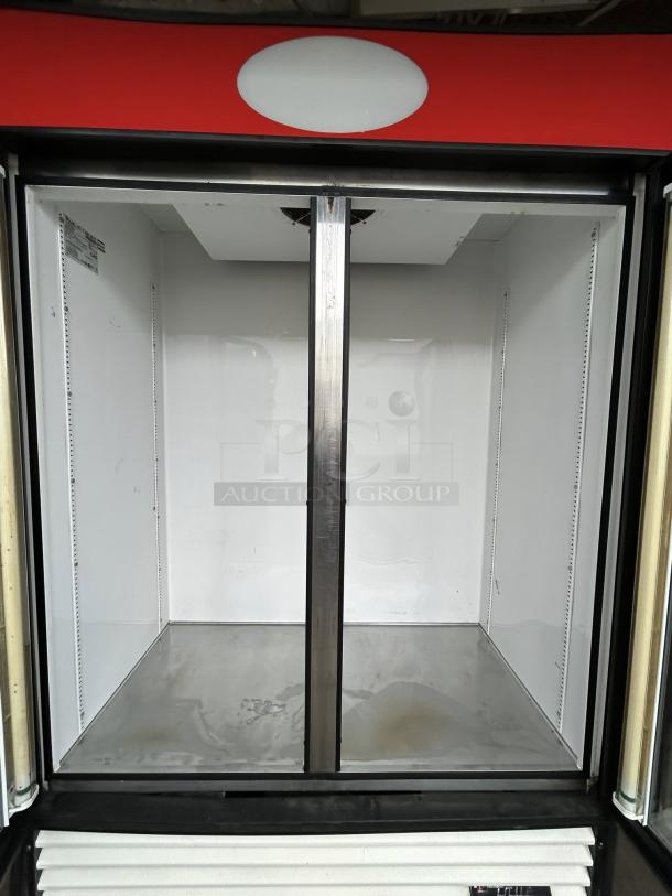 True GDM-49-HC~TSL01 black refrigerated glass door merchandiser, 54 1/4", great condition, tested, working.