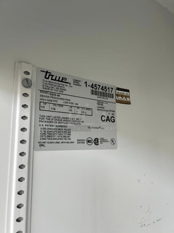 True GDM-49-HC~TSL01 label, black refrigerated glass door merchandiser, great condition, tested and working, made in USA.