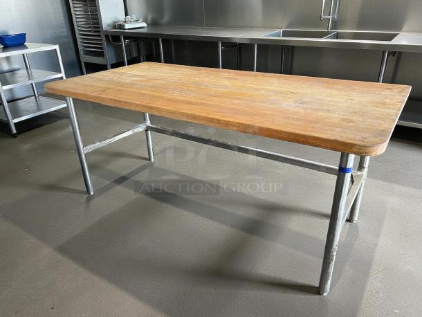 John Boos HNS19 work table, 84"x36", laminated flat top, wood, metal legs, great condition, commercial kitchen setting.