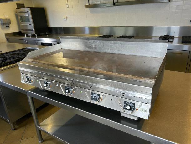 Garland UTGG60-GT60M heavy-duty gas griddle, excellent condition, thermostatic controls, stainless steel, tested and working.