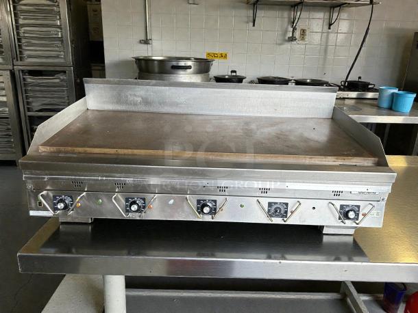 Garland UTGG60-GT60M gas griddle, excellent condition, stainless steel, thermostatic controls, tested and working.