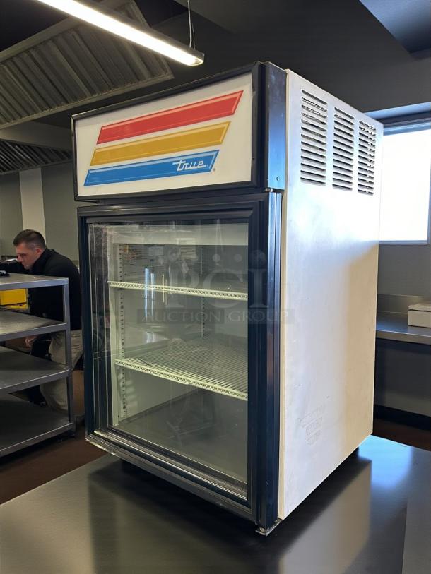 True GDM-05-HC~TSL01 black refrigerated glass door countertop merchandiser. Excellent condition, tested and working.