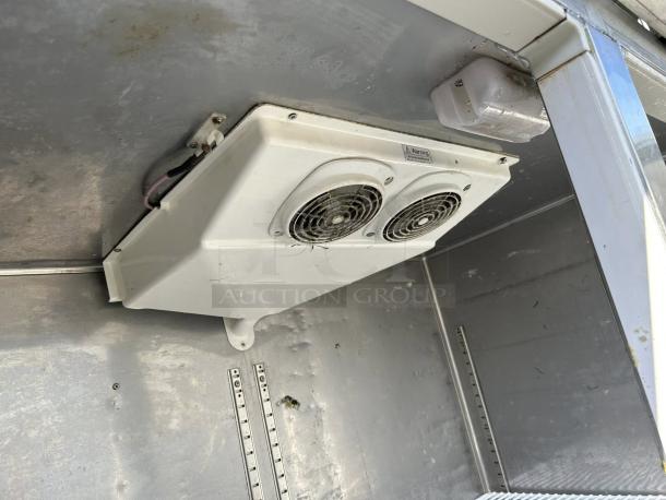 Everest ESR2 49" reach-in refrigerator interior with fan unit. Great condition, tested, two solid full doors, top mount.