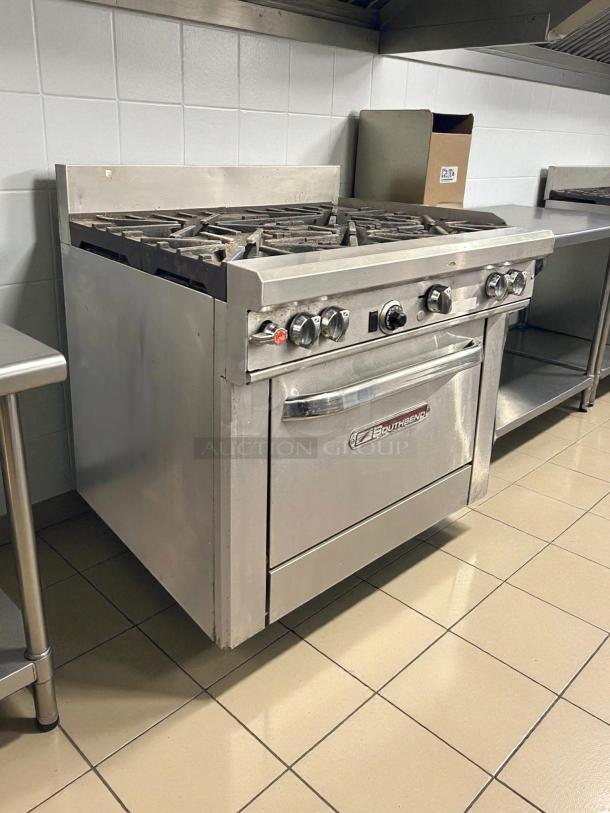Southbend S36D 36" natural gas range with 6-burners and standard oven. Tested and working, stainless steel, signs of use.