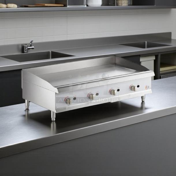 Cooking Performance Group GM-CPG-48-NL 48" gas griddle, manual controls, stainless steel, great condition, tested and working.