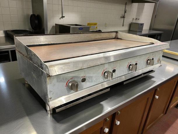 Cooking Performance Group GM-CPG-48-NL 48" gas countertop griddle, great condition, manual controls, tested and working.